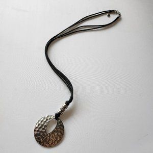Hammered Metal Donut Pendant on Long Black Corded Necklace